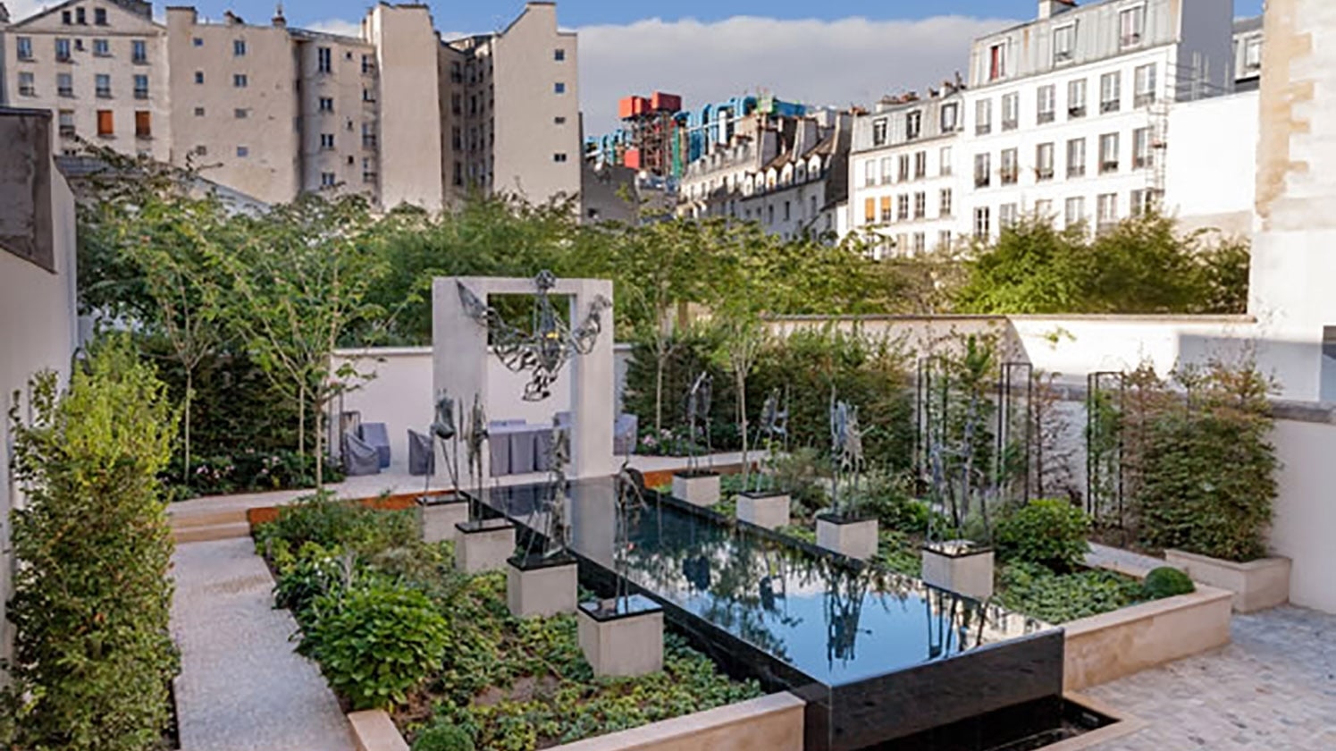 http://Le%20jardin%20de%20l'hôtel%20Beaubrun%20dans%20le%20Marais%20à%20Paris